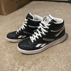 Black high top Reebok shoes